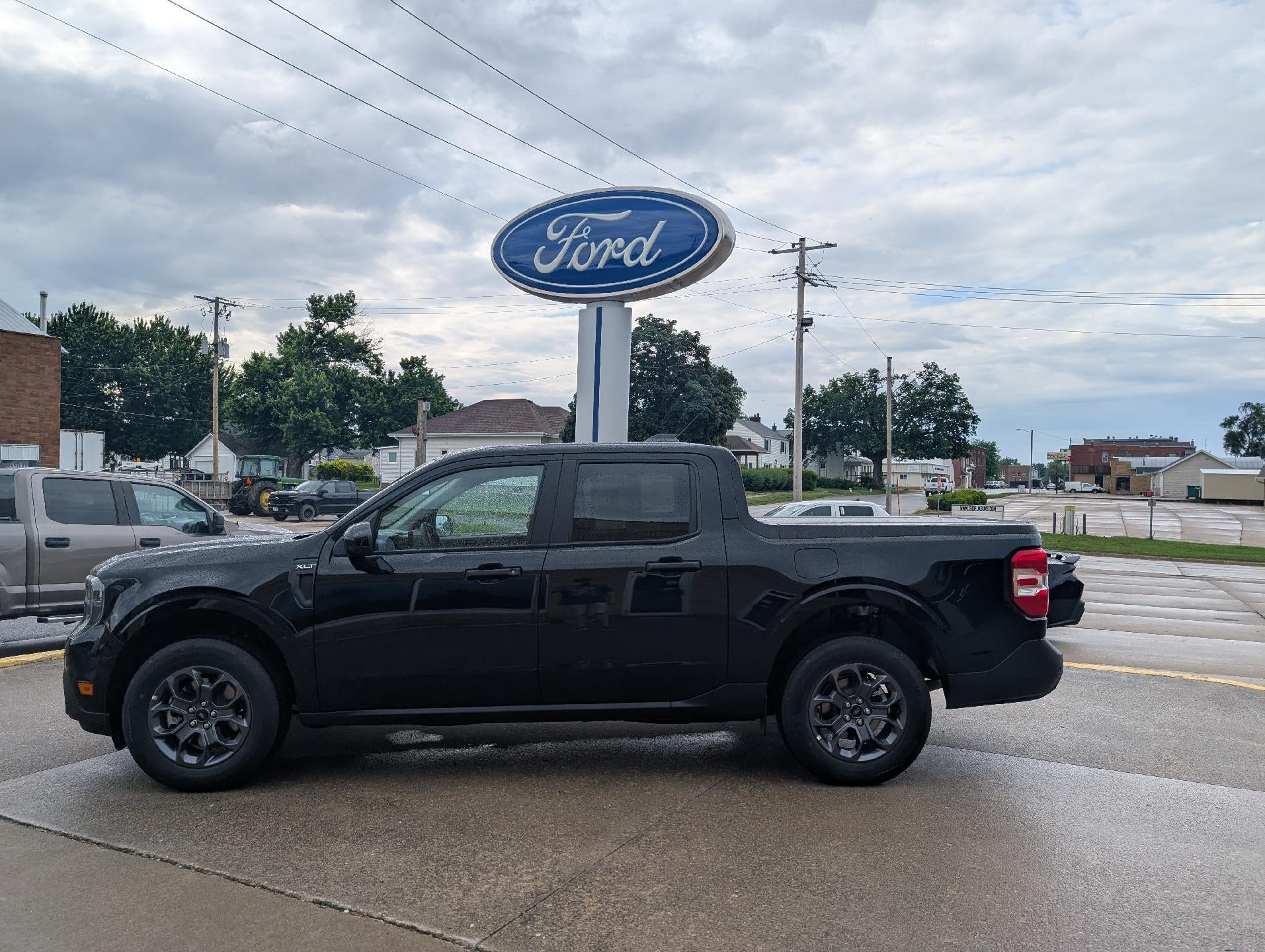 2026 Ford Maverick XLT AWD SuperCrew in Shadow Black — front three-quarter view
