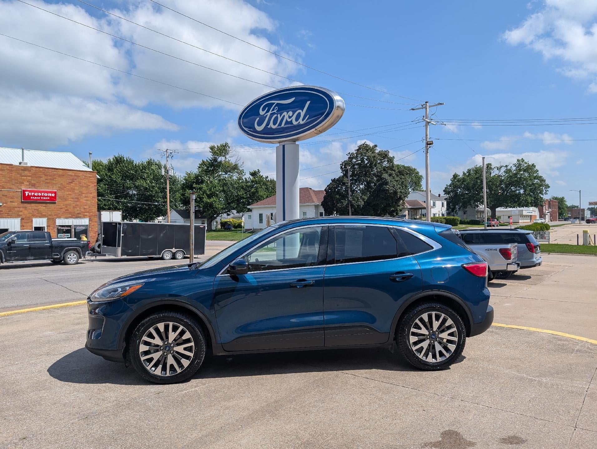 2020 Ford Escape Titanium AWD in Dark Persian Green Metallic — front three-quarter view